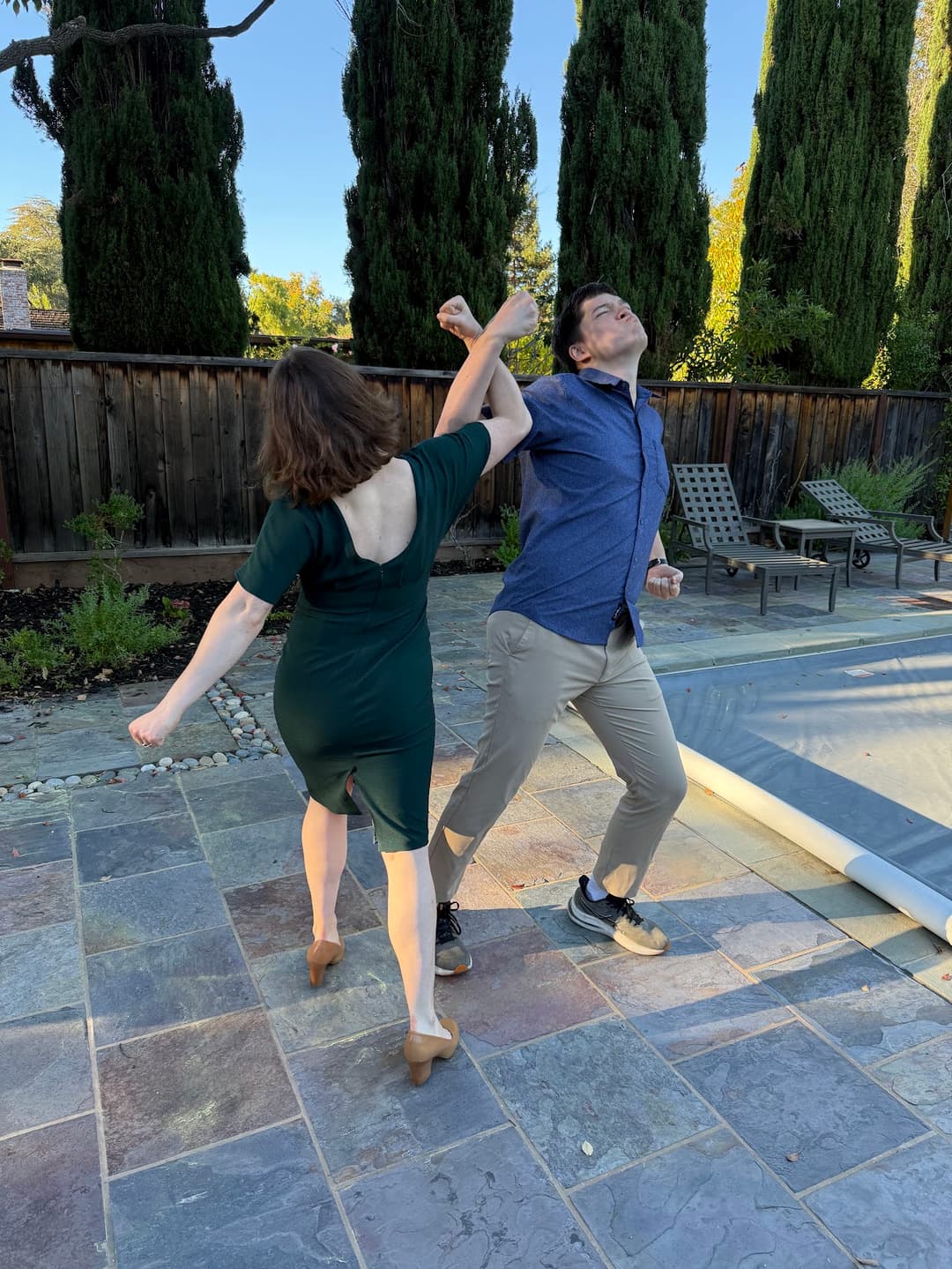 John and Caitlin flexing during engagement photo shoot